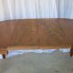 1930s oak dining table, slightly oval.