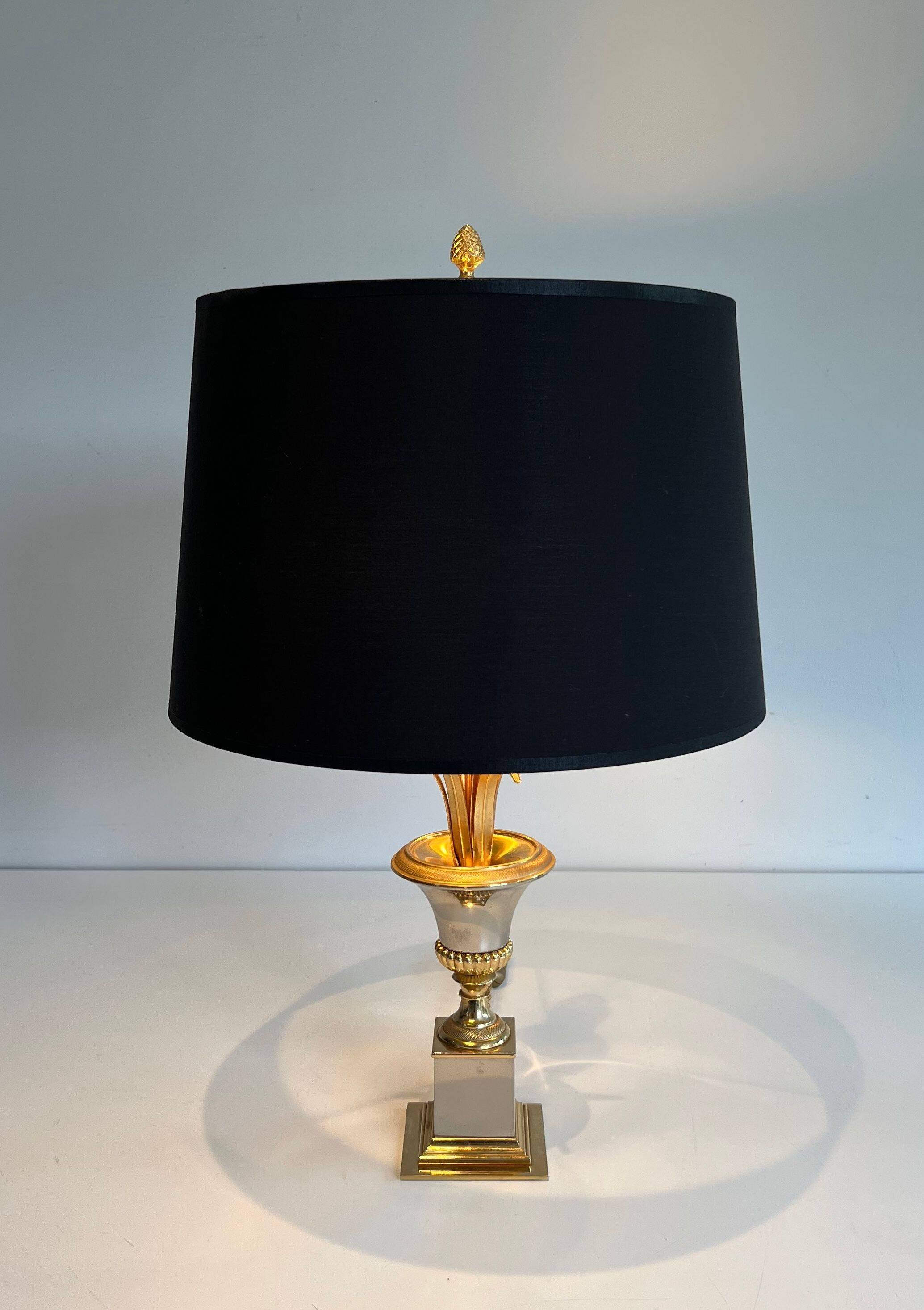 Pair of palm lamps in chrome and brass in the style of Maison Charles. Circa 1970.