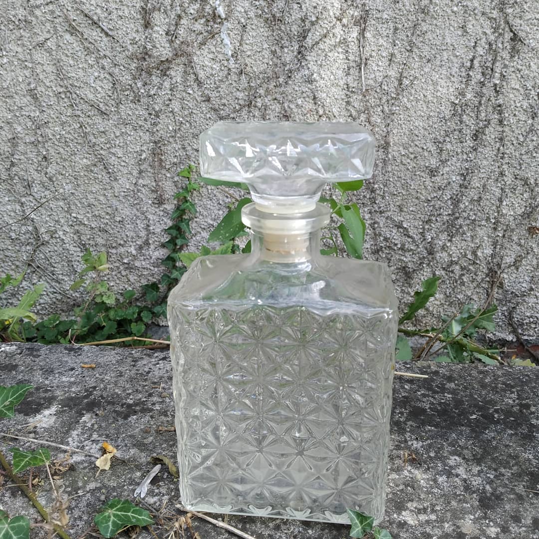 3 glass whiskey bottles