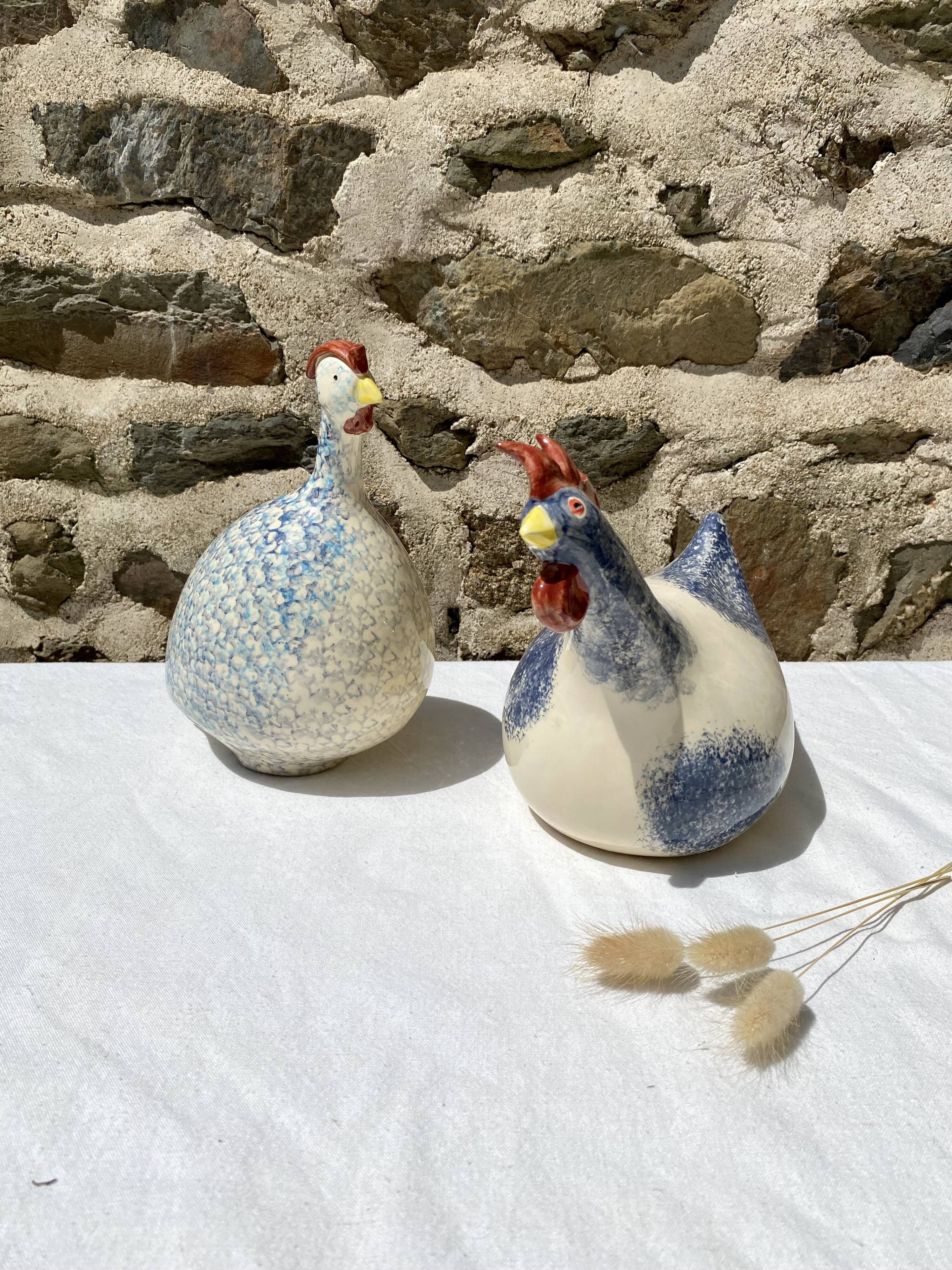 Signed ceramic hen and guinea fowl