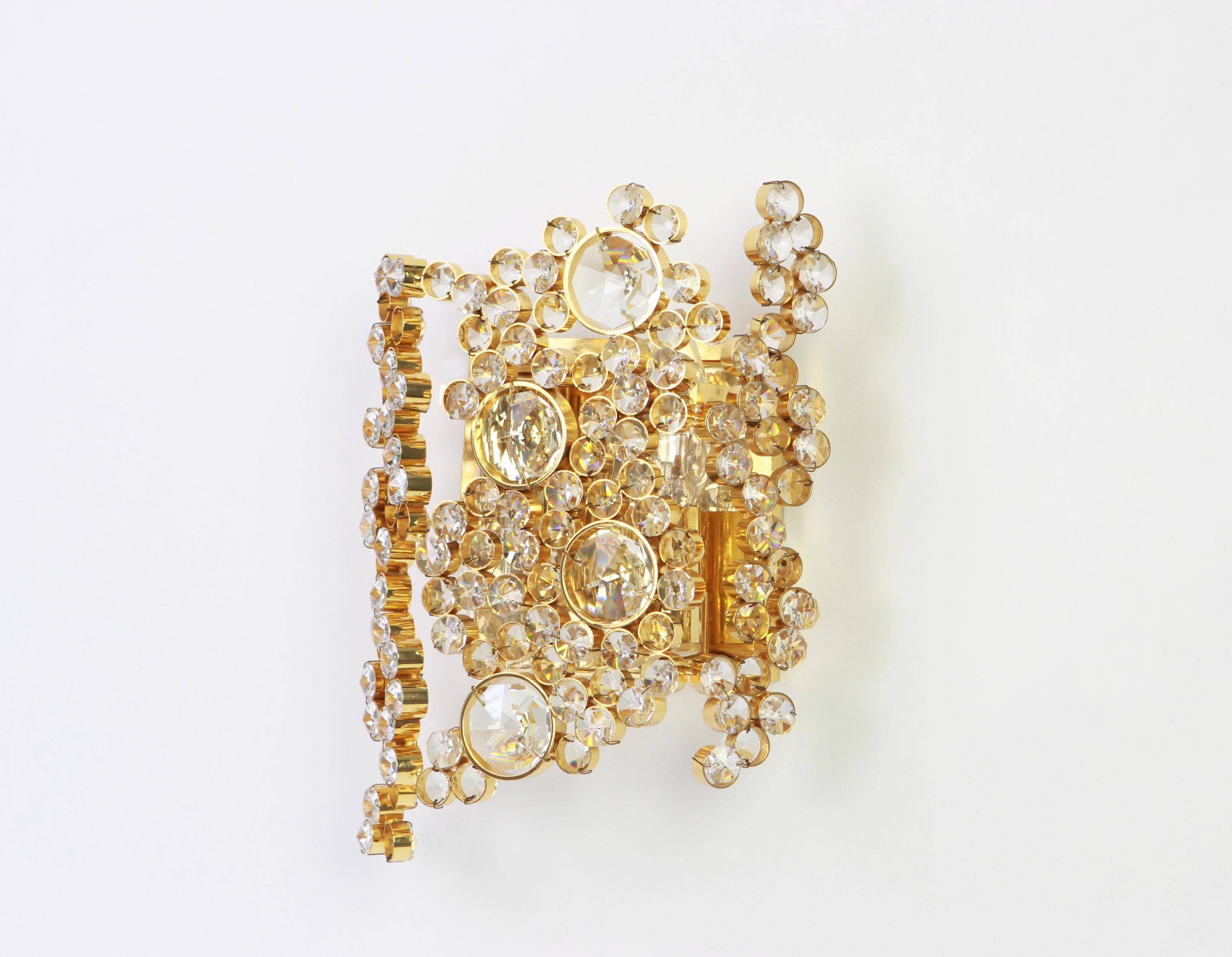 Pair of wall sconces in gilded brass and crystal by Palwa, Germany, 1960s.