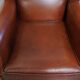 Fauteuil à oreilles de style anglais en cuir de vachette