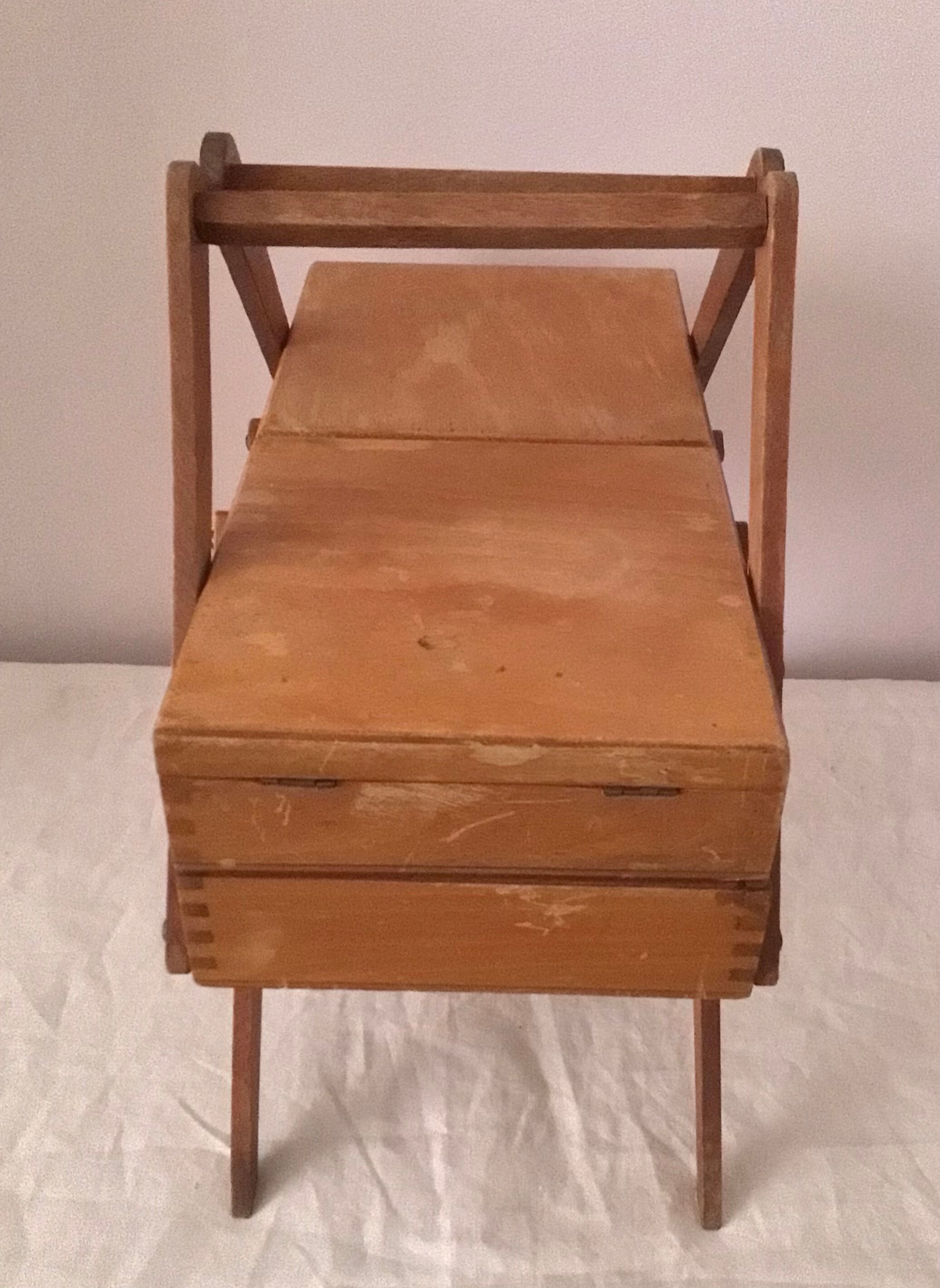Worker, former sewing box