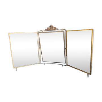 Antique French gilt metal triptych vanity mirror with floral crest