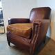Old studded leather club chair 1930-1930