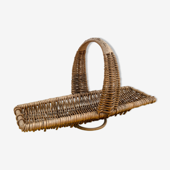 Handmade basket in woven rattan