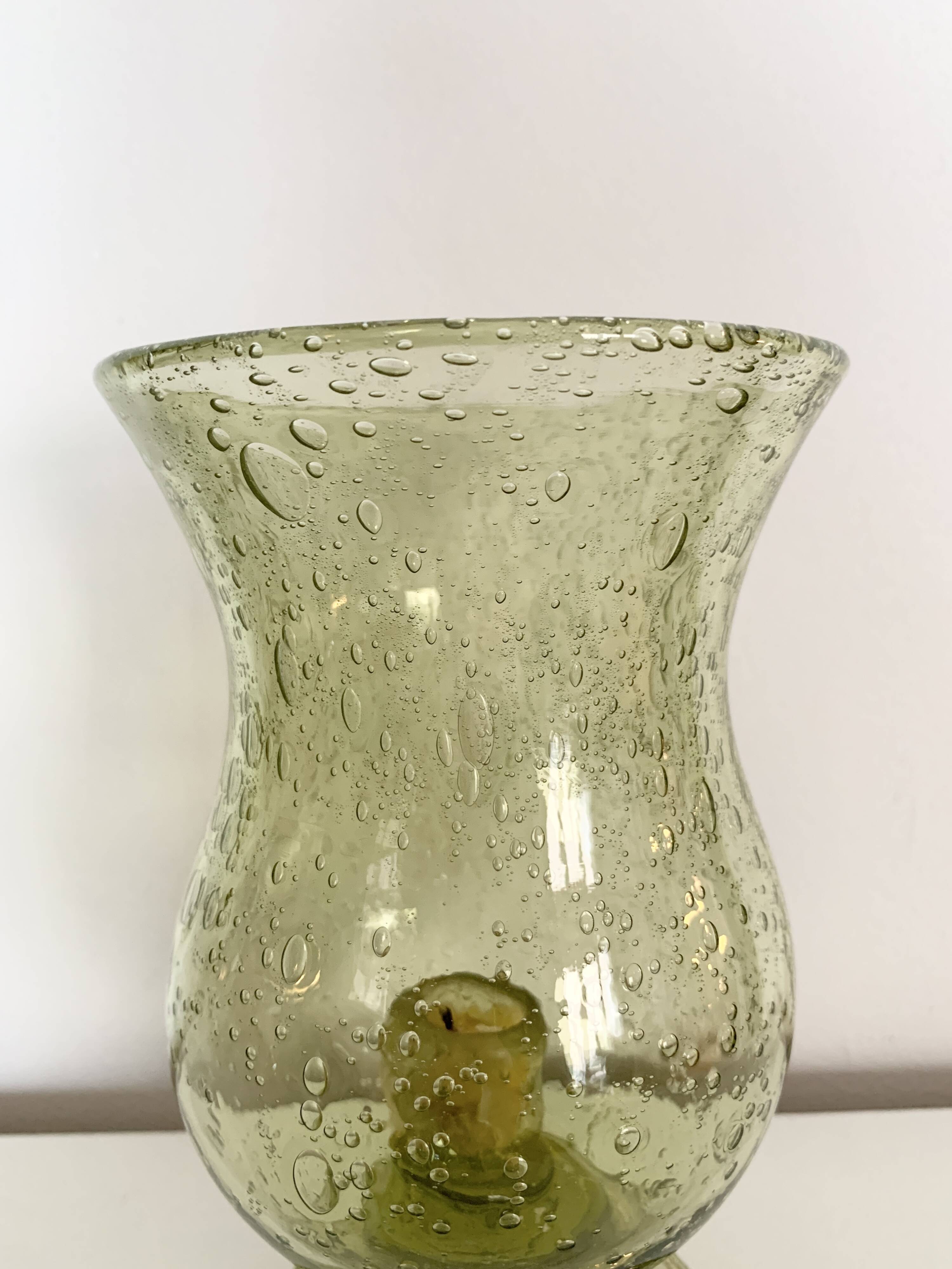 Important green bubbled glass candlestick