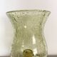 Important green bubbled glass candlestick