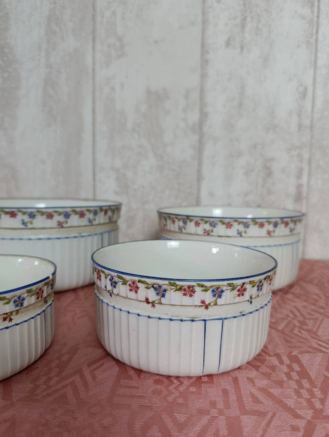 Nested porcelain salad bowls decorated