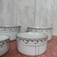 Nested porcelain salad bowls decorated