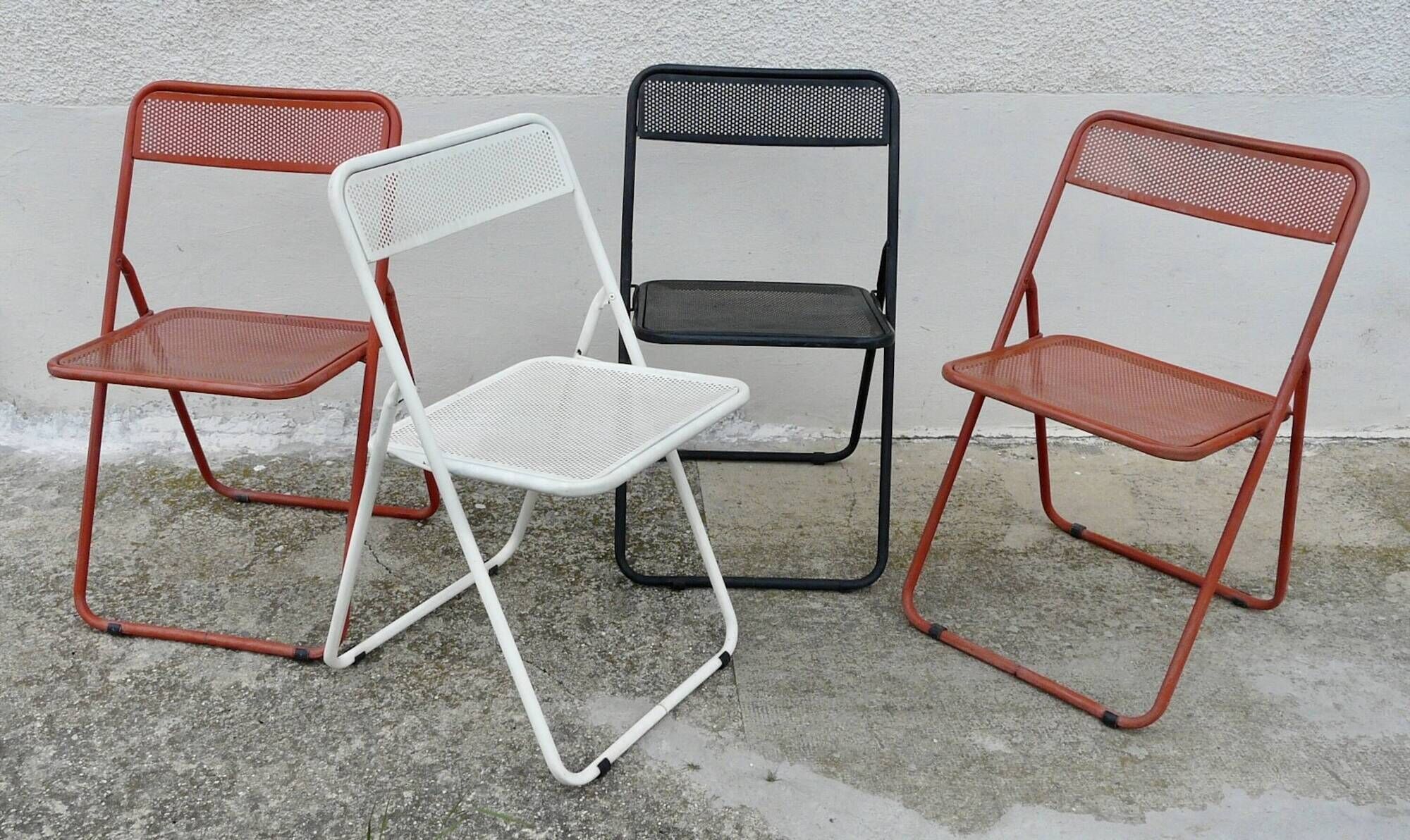 Set of 4 vintage perforated metal folding chairs 1970-80 red, white and black