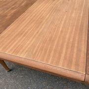 Renovated round extendable dining table made of solid mahogany from the 19th century.