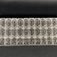 Set of 12 molded glass or crystal knife rests with diamond point decor
