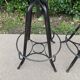 Pair of vintage metal and leather bar stools