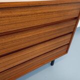 Vintage Scandinavian modernist chest of drawers in rosewood and black metal.
