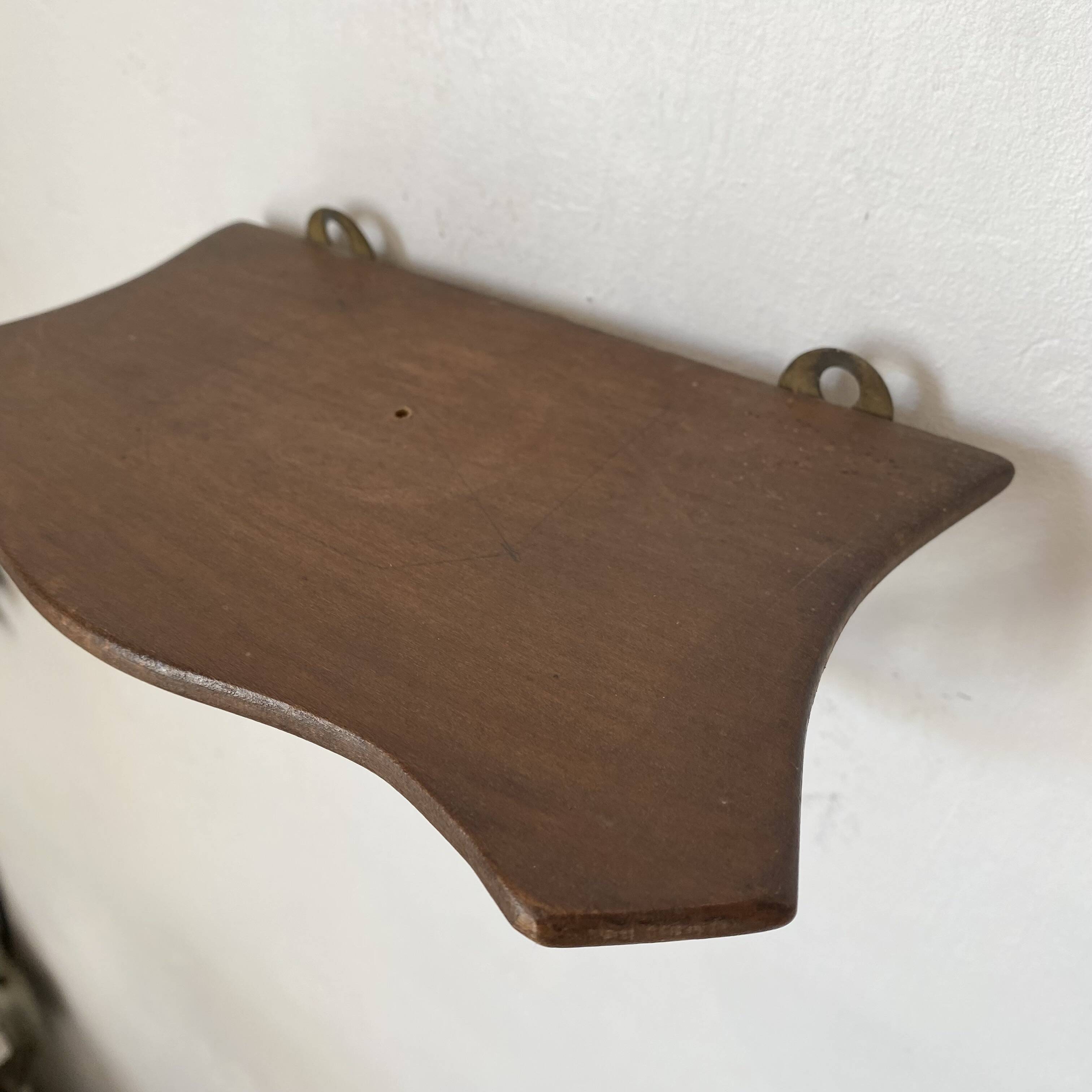 baroque shelf in wood and bronze ribbon