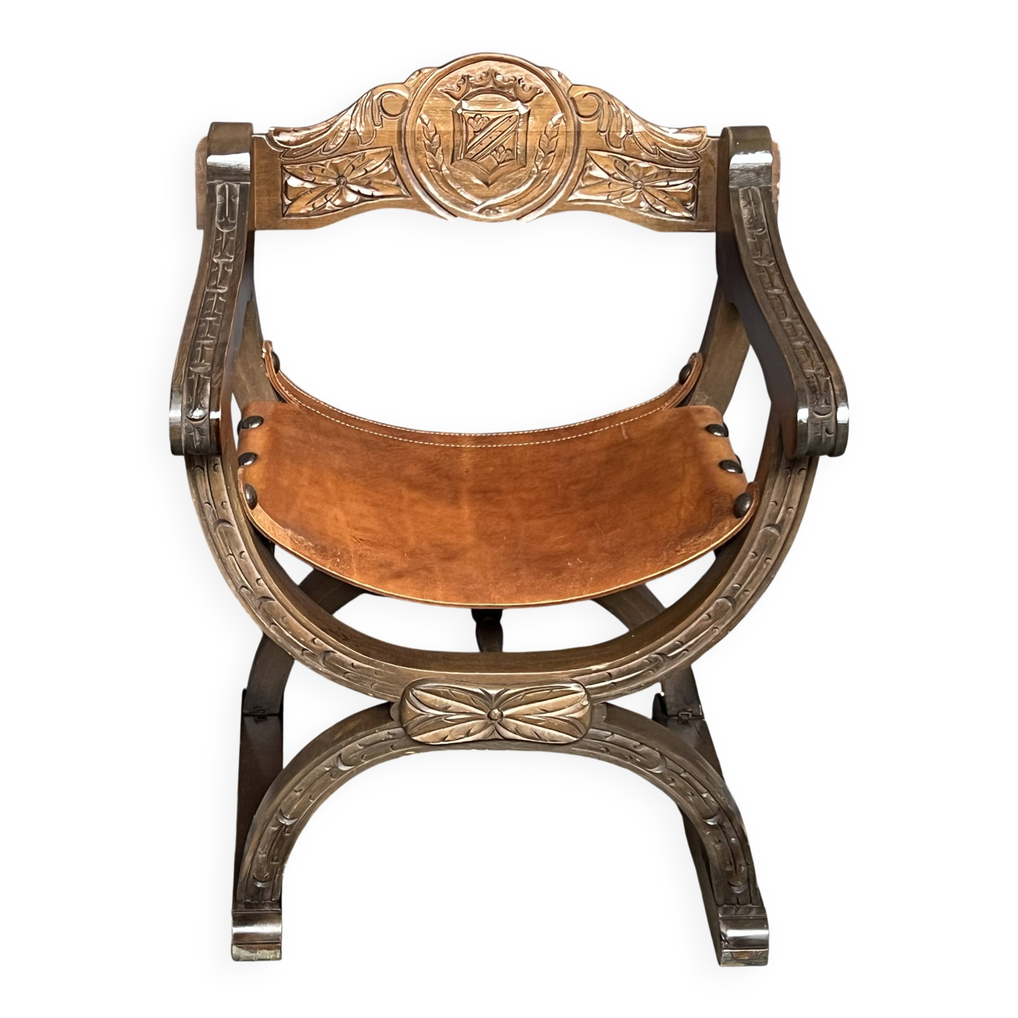 Dagobert style armchair. Solid walnut, leather.