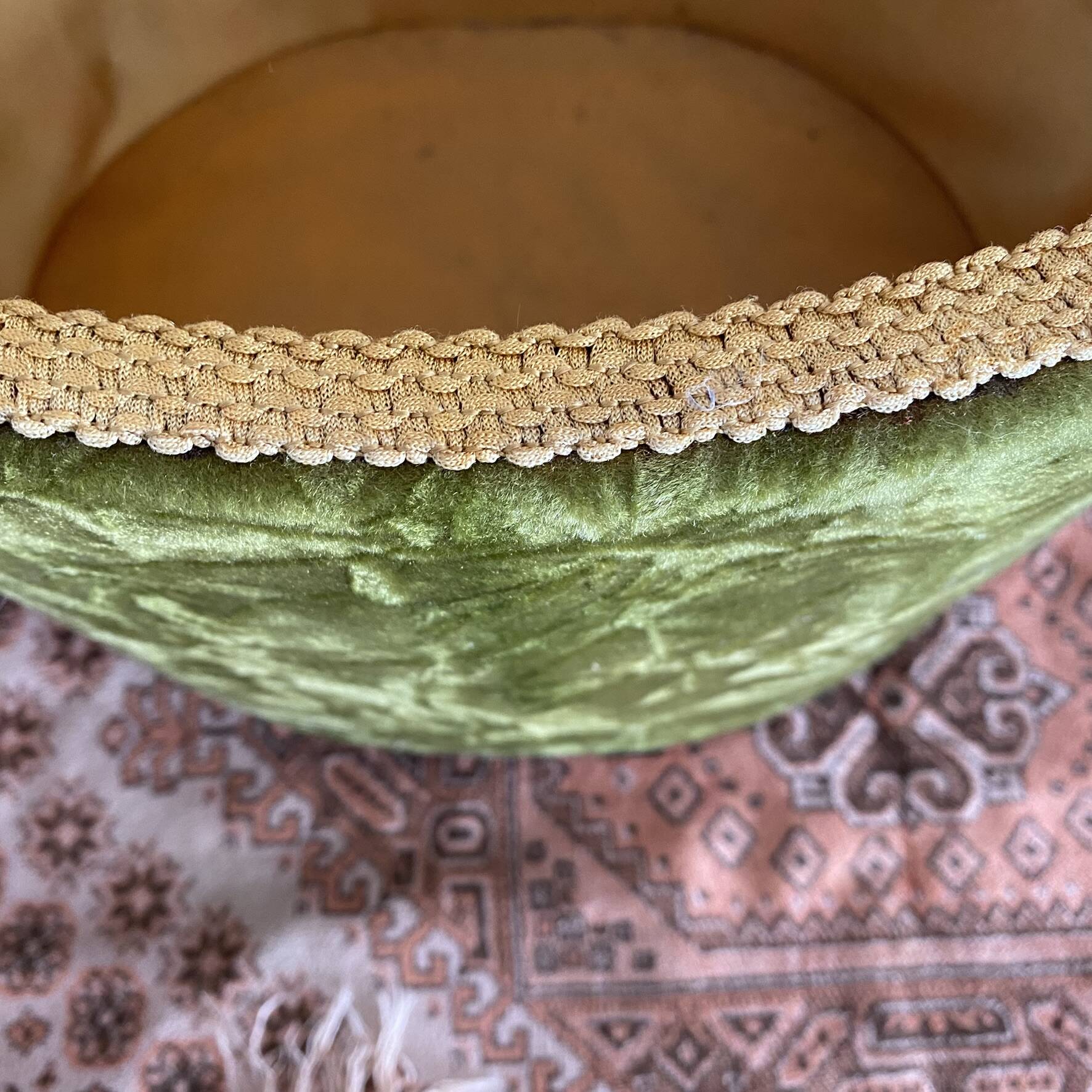 Green velvet storage pouffe from the 1960s.
