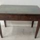 Louis XVI style desk in mahogany and veneer, 19th century.