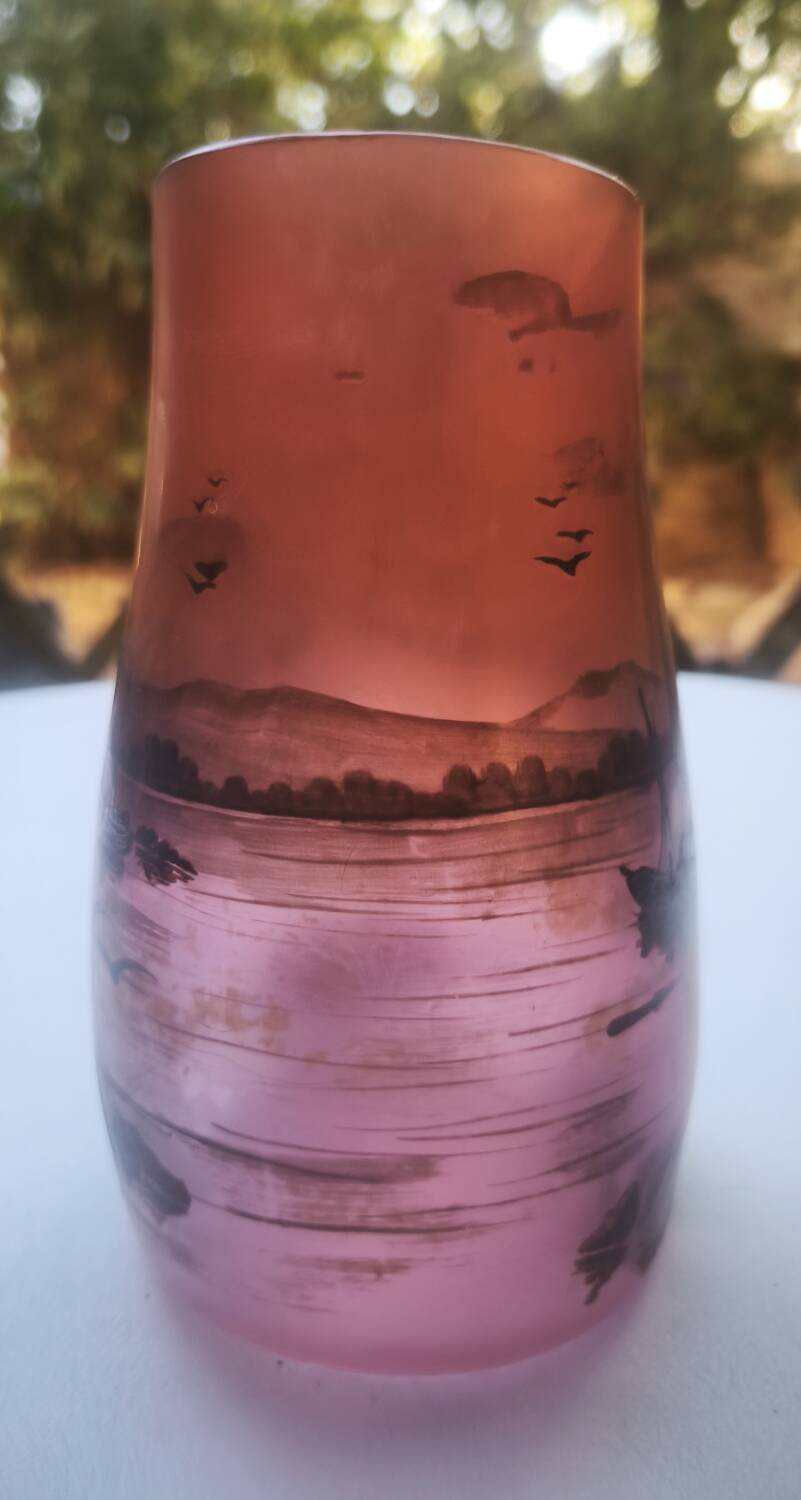 Vase signed Michel with a lakeside decoration.