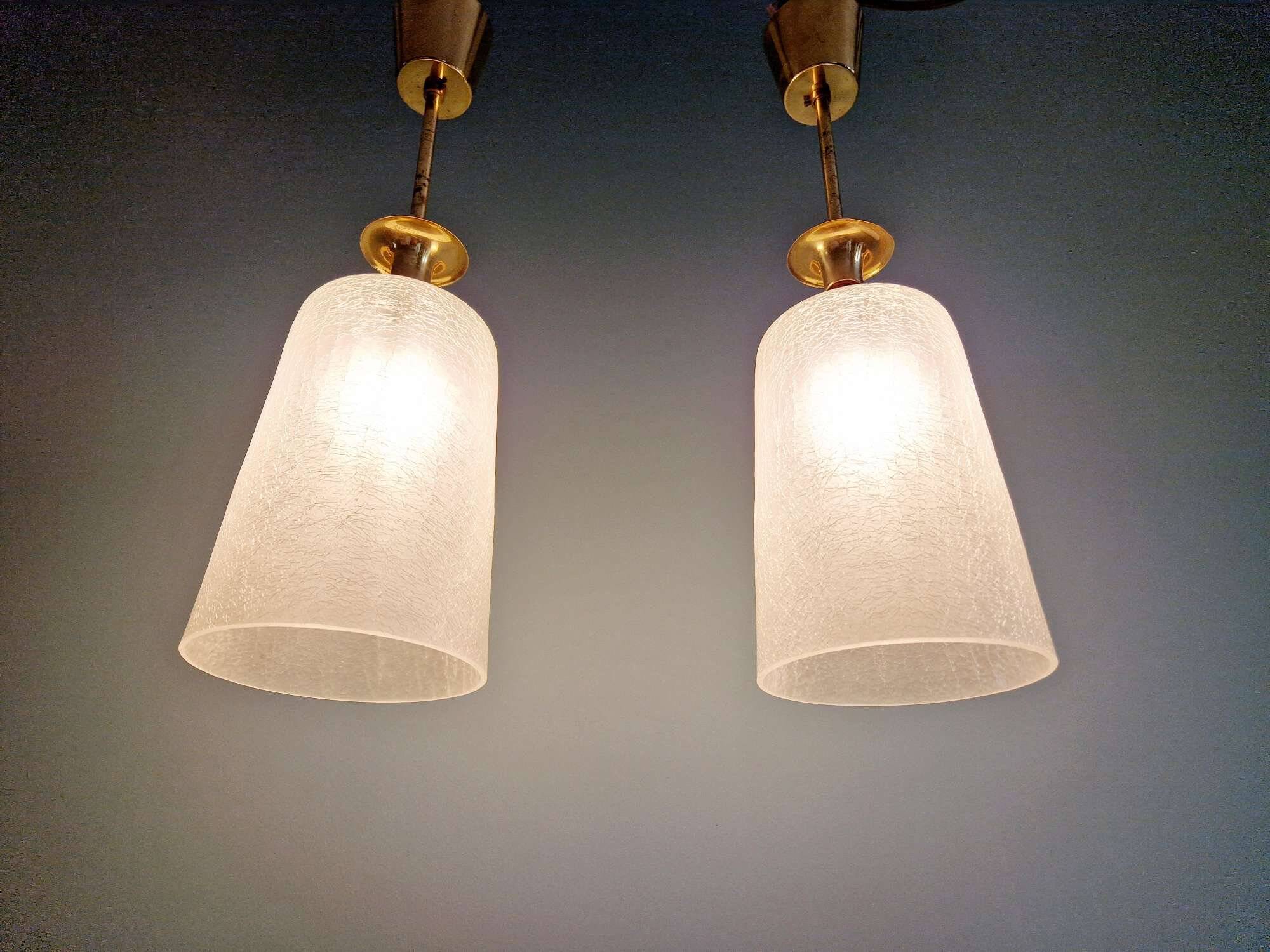 Pair of brass and cracked glass pendants, 1950-60.
