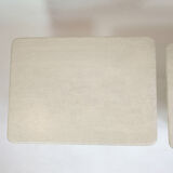 Pair of travertine trundle tables, Italy