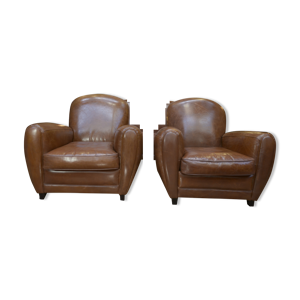 Paire de fauteuils club en cuir