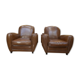 Paire de fauteuils club en cuir