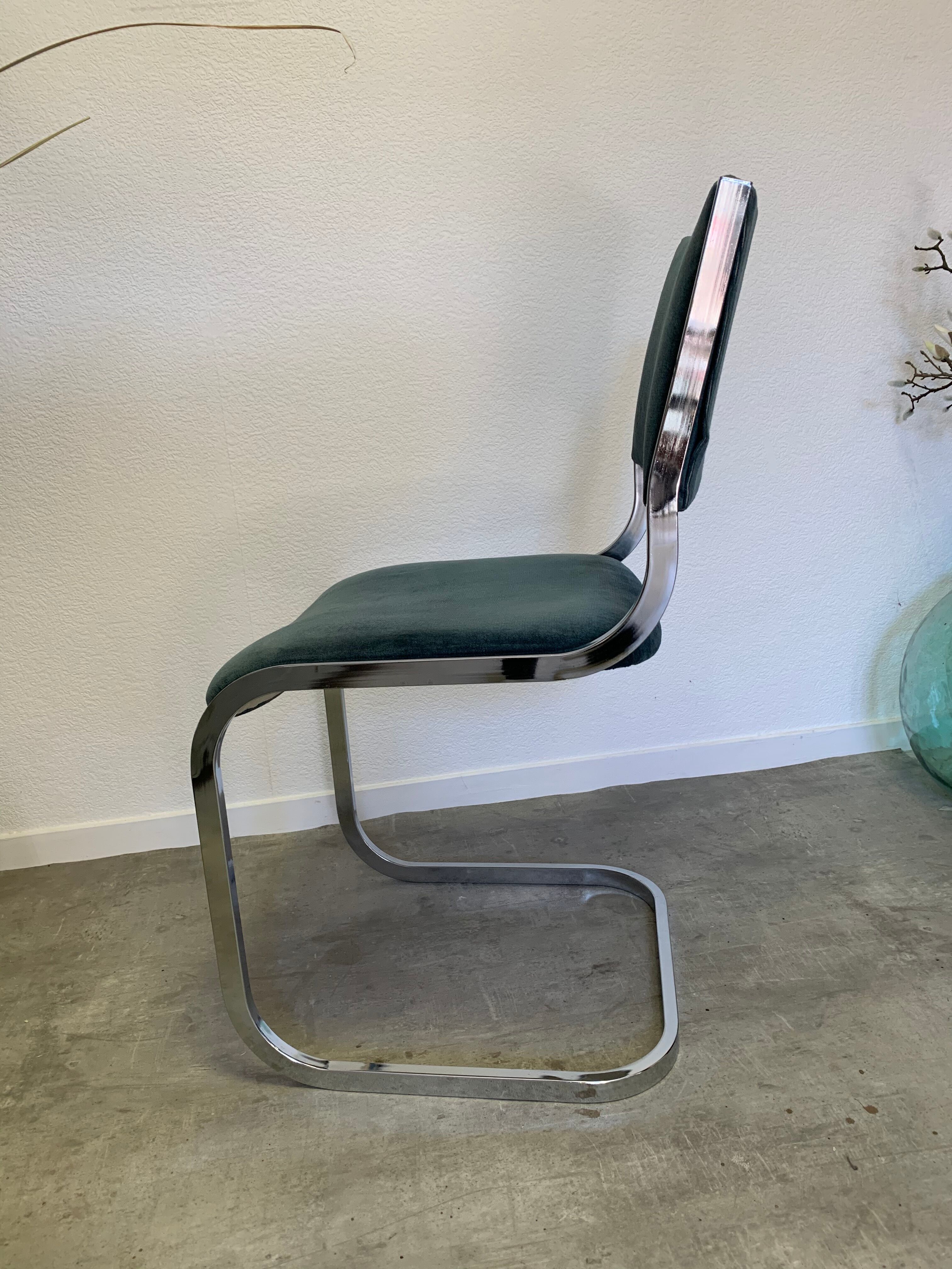 Pair of chrome blue chairs  70