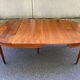 Round extendable dining table Louis XVI in cherry wood from the 1960s.