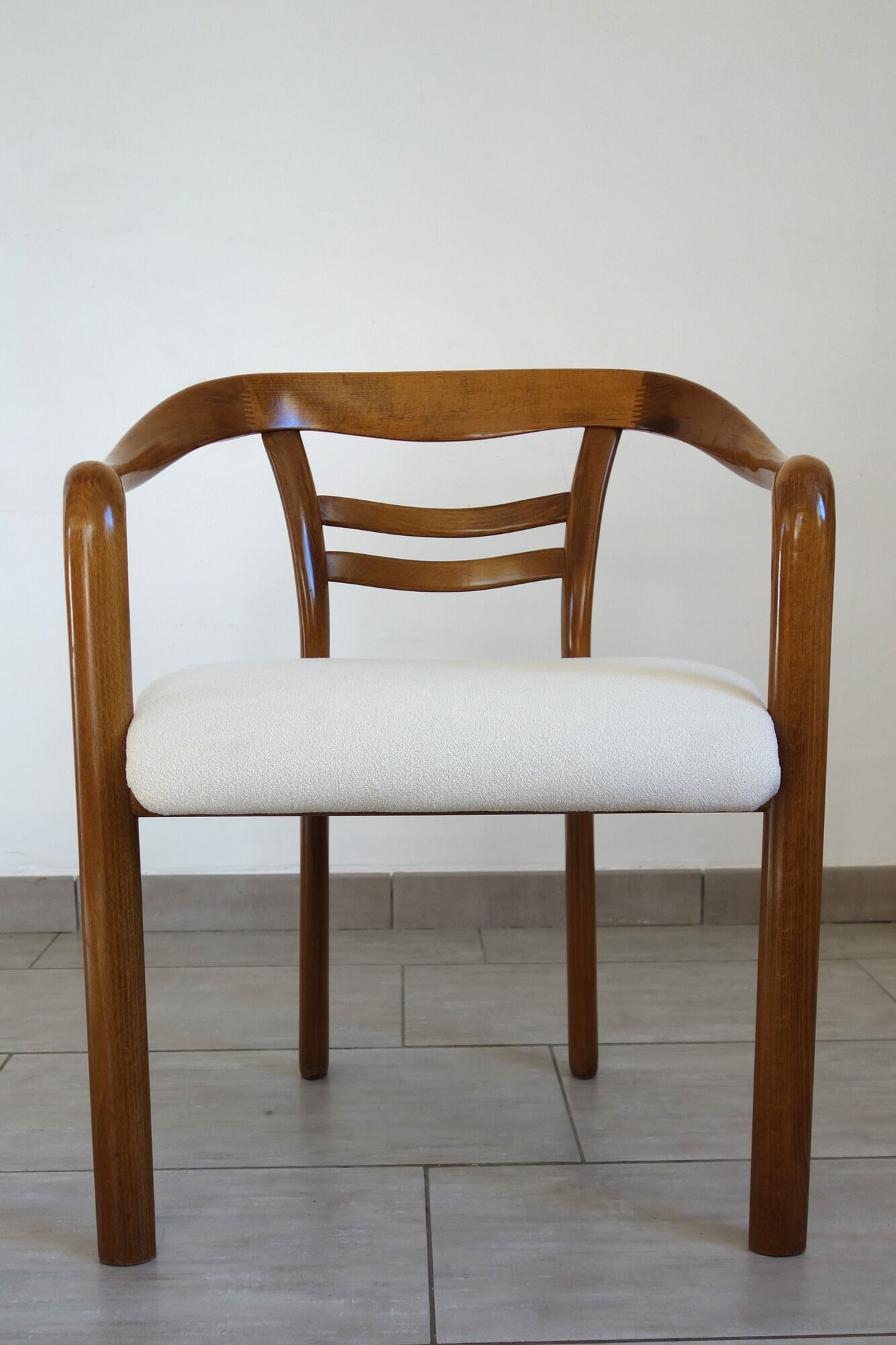 Vintage wooden armchair and thin buckle