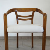 Vintage wooden armchair and thin buckle