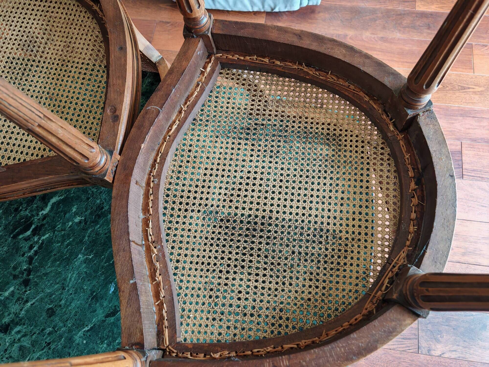 Caned armchairs