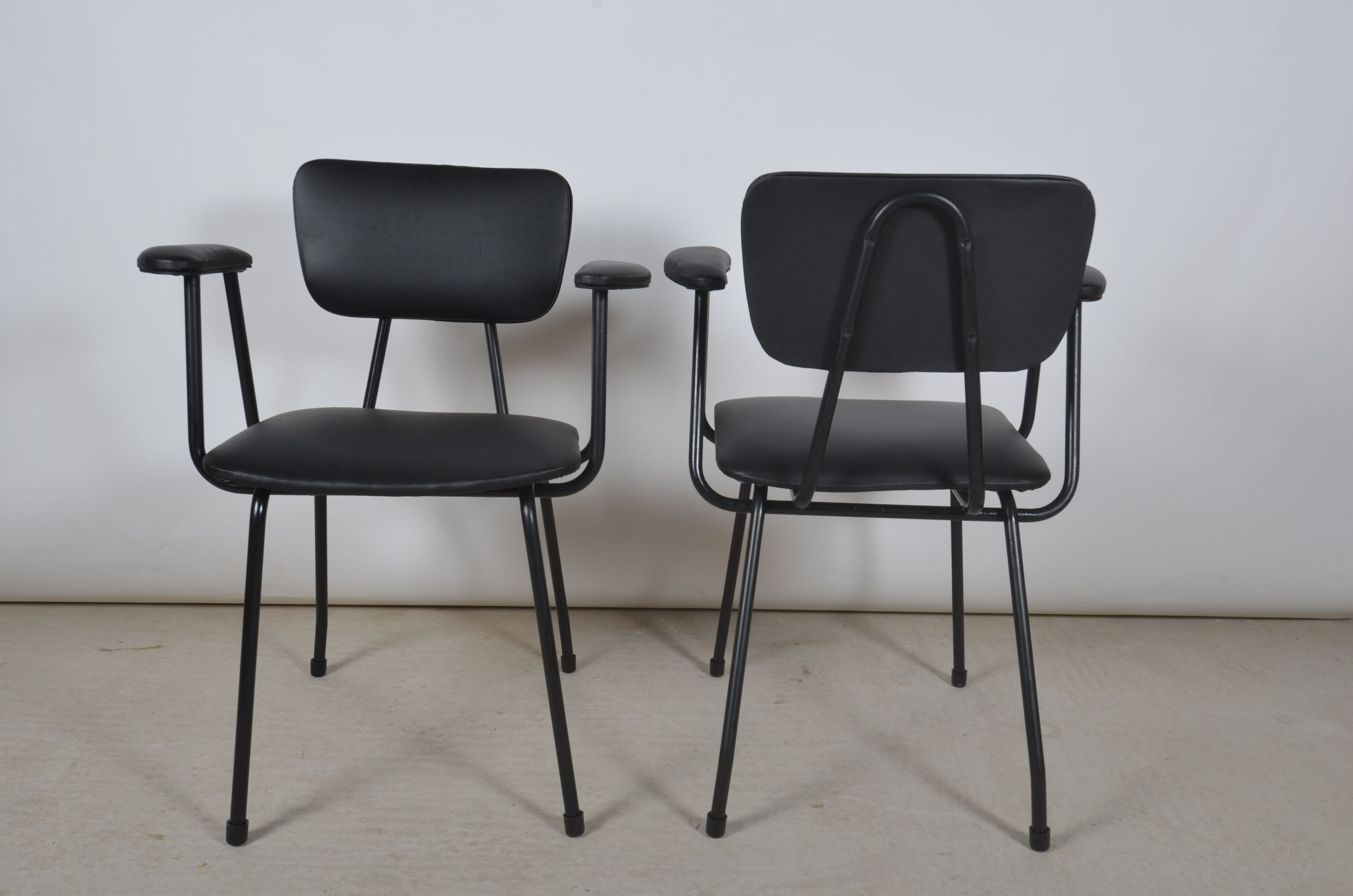 Armchairs in black skaï 1950