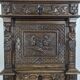 Renaissance-style cabinet in solid oak decorated with chimeras and caryatids