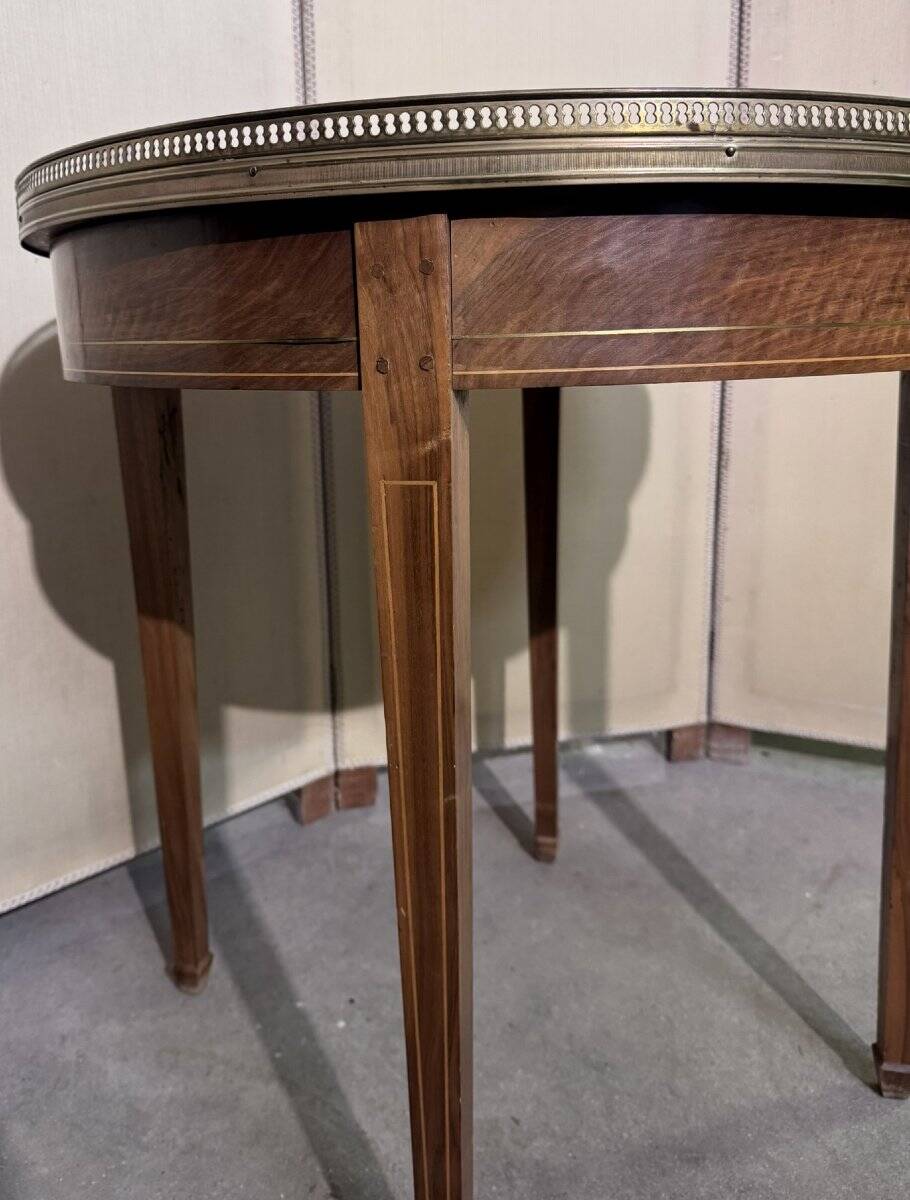 Bouillotte table in Louis XVI style with marquetry and gilded brass inlays.