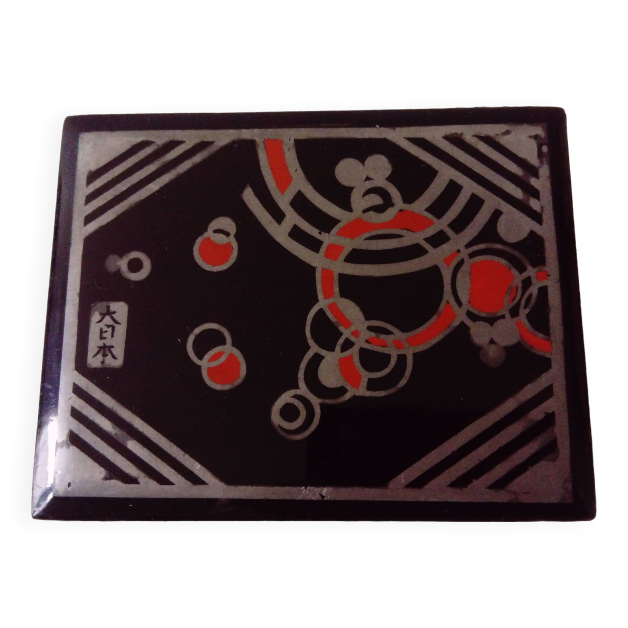 Small black lacquered box with Art Deco decor.Japan