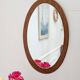 Miroir ovale scandinave en teck – années 60
