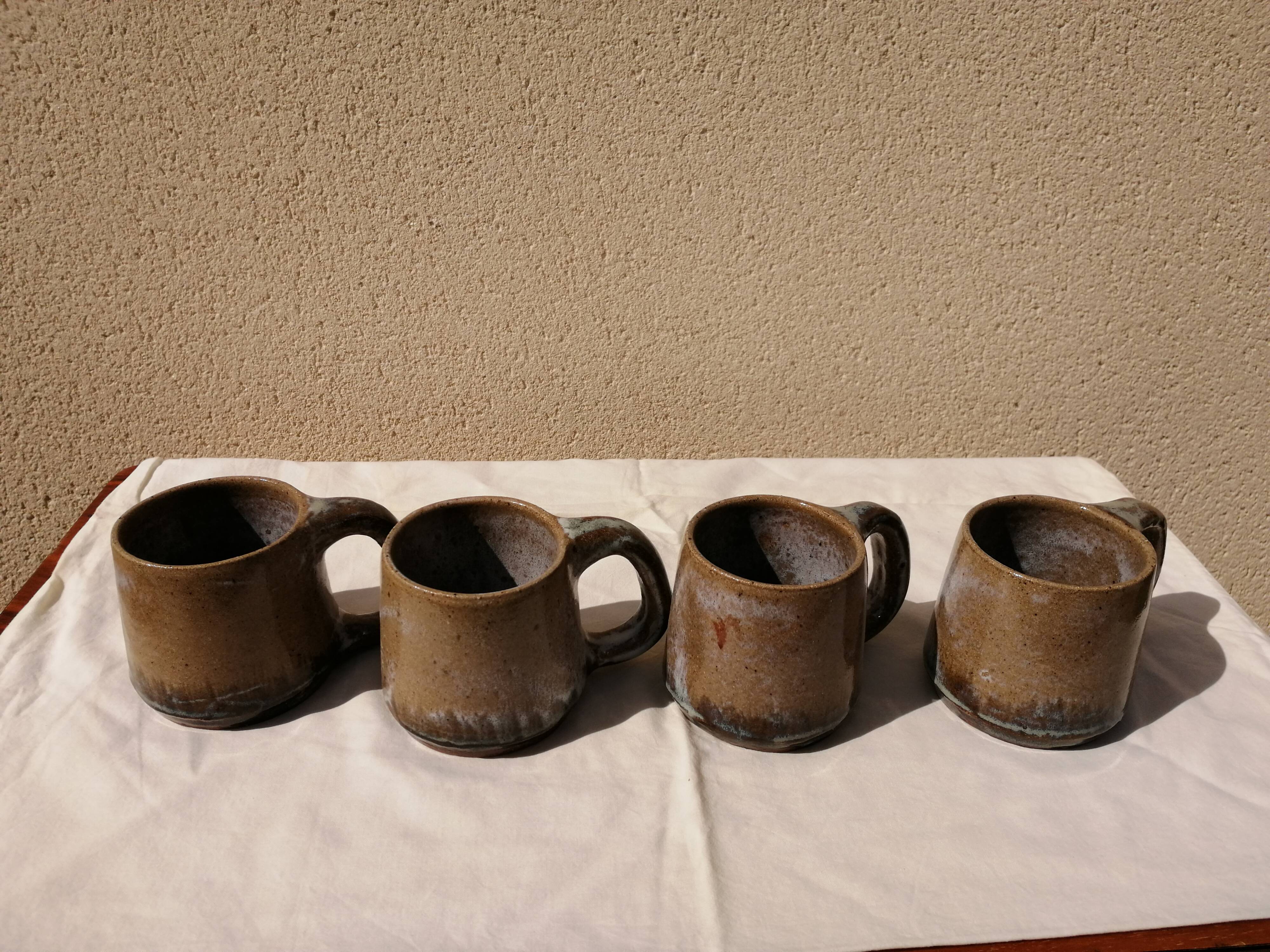 Lot of 4 sandstone glasses