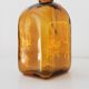 Vintage amber glass apothecary bottle