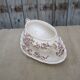 Sausage with decor of floral ribbons Longchamps