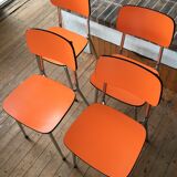 Lot of 4 vintage chairs in orange formica