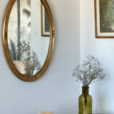 Oval mirror in carved wood