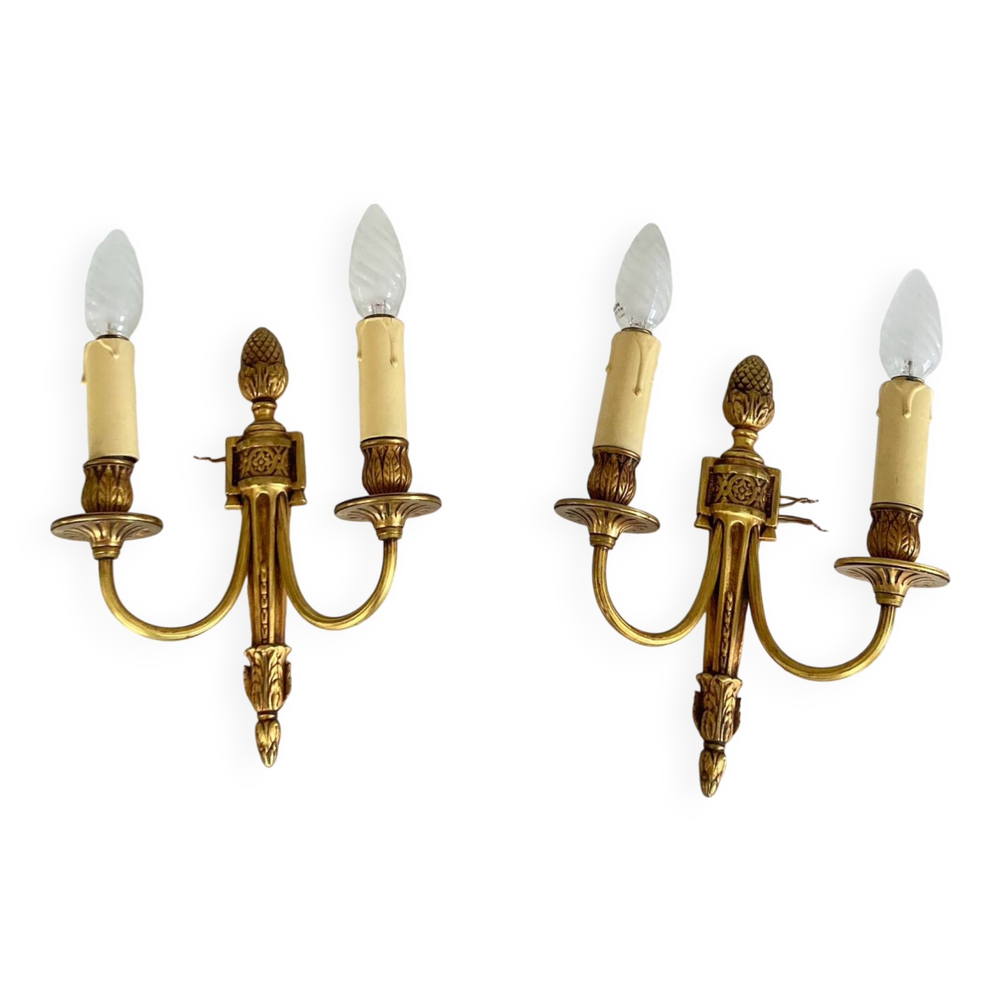 St Louis XVI gilded bronze wall lights with foliage and pine cone decorations