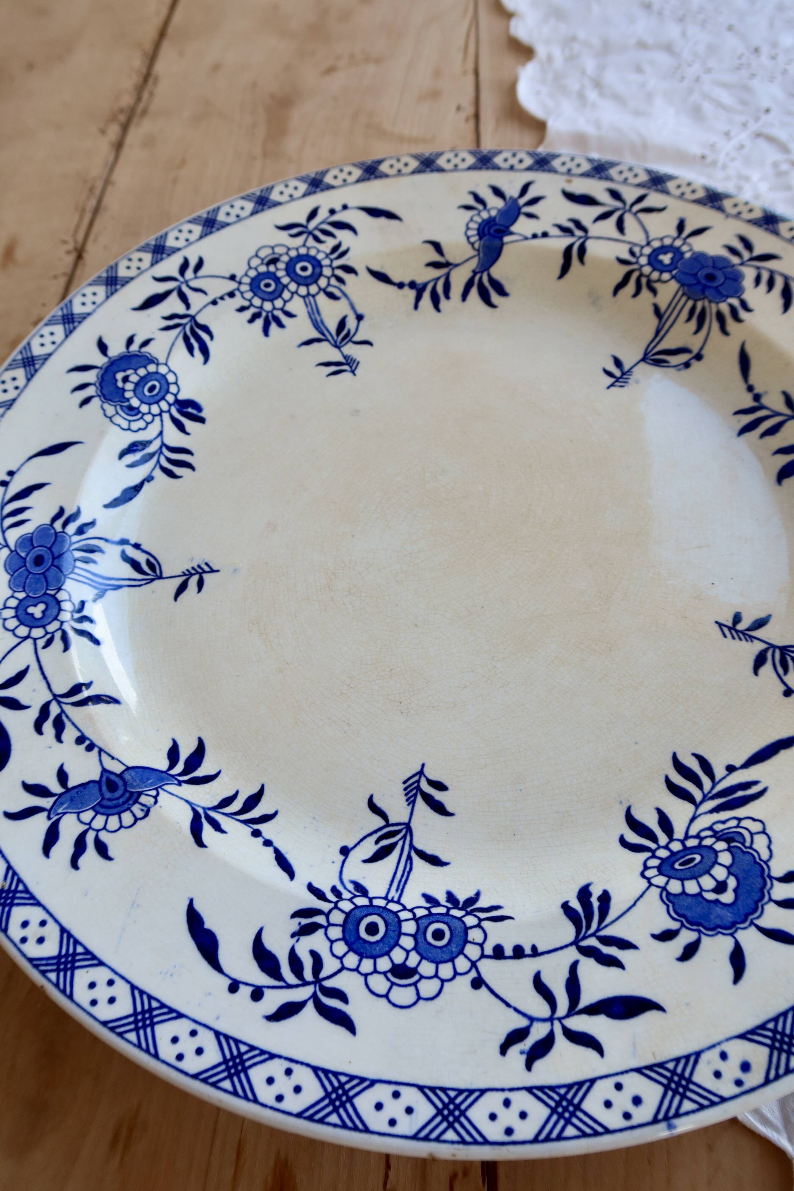 Large round antique plate, blue and white Dresden porcelain.