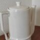 Small coffee maker with floral decoration