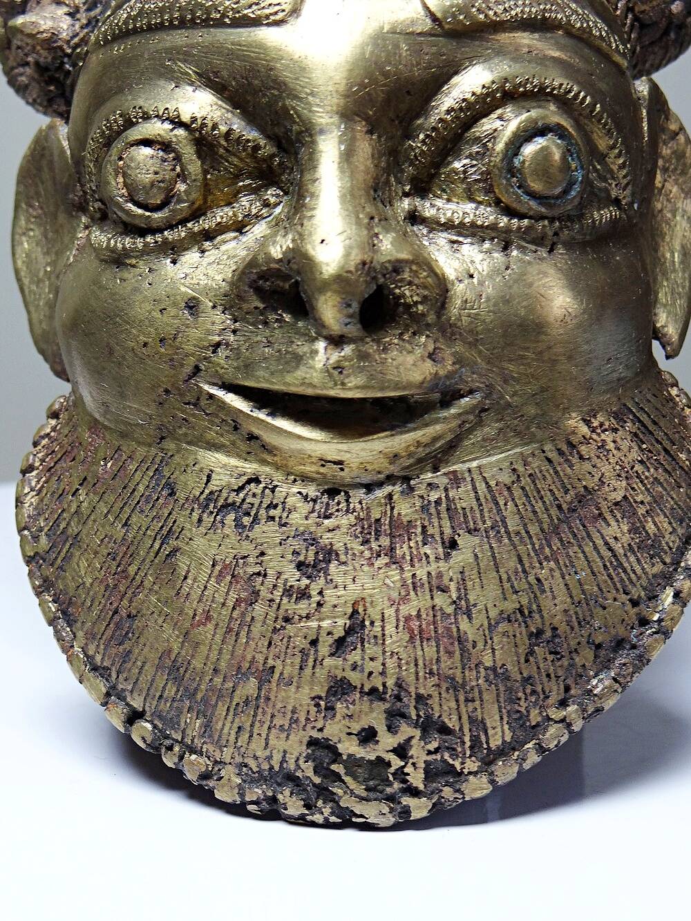 Small gilded bronze Oba mask from Bamoun, Cameroon, vintage Africa
