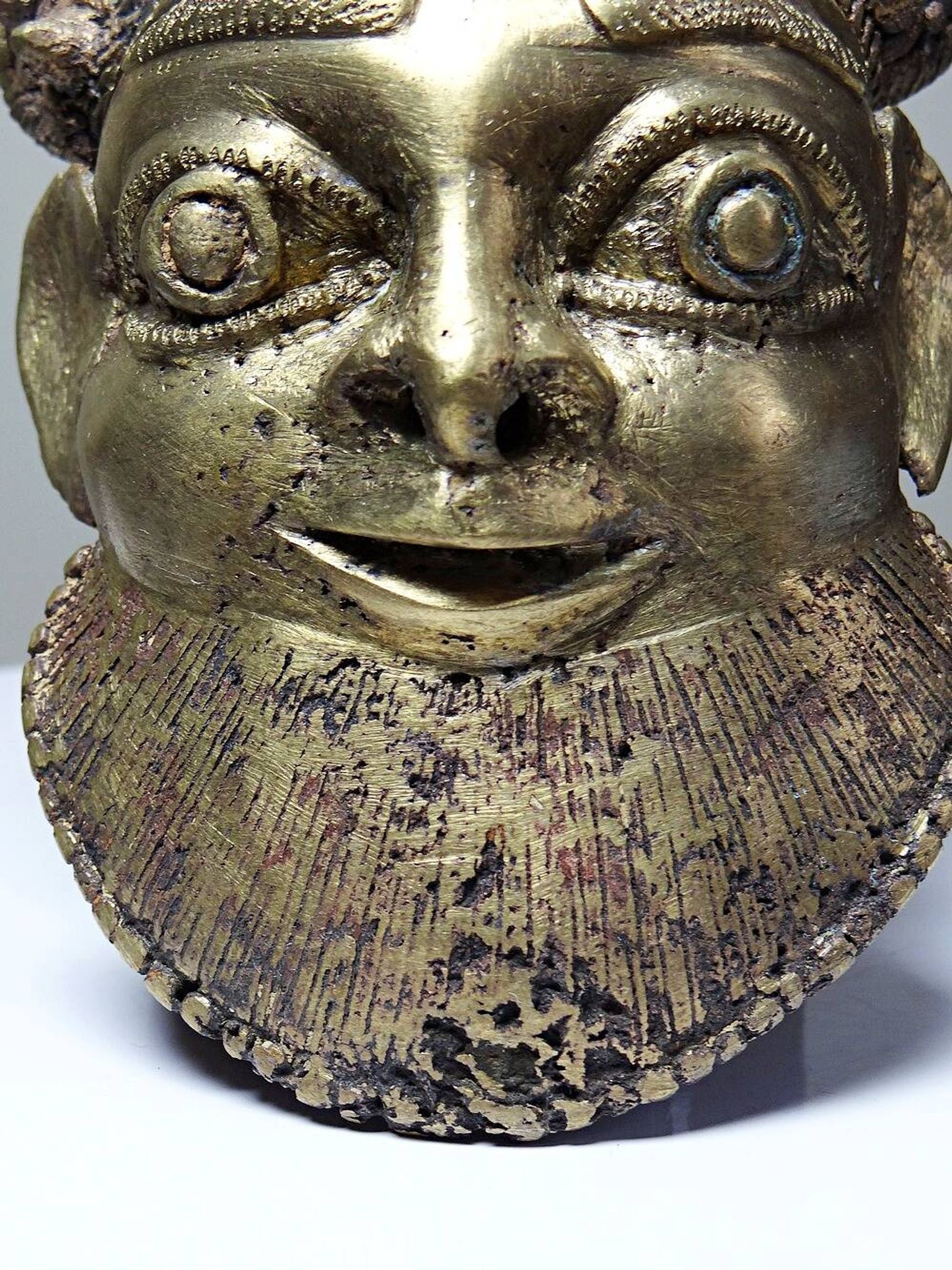 Small gilded bronze Oba mask from Bamoun, Cameroon, vintage Africa