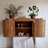 Art-deco wall showcase in raw oak
