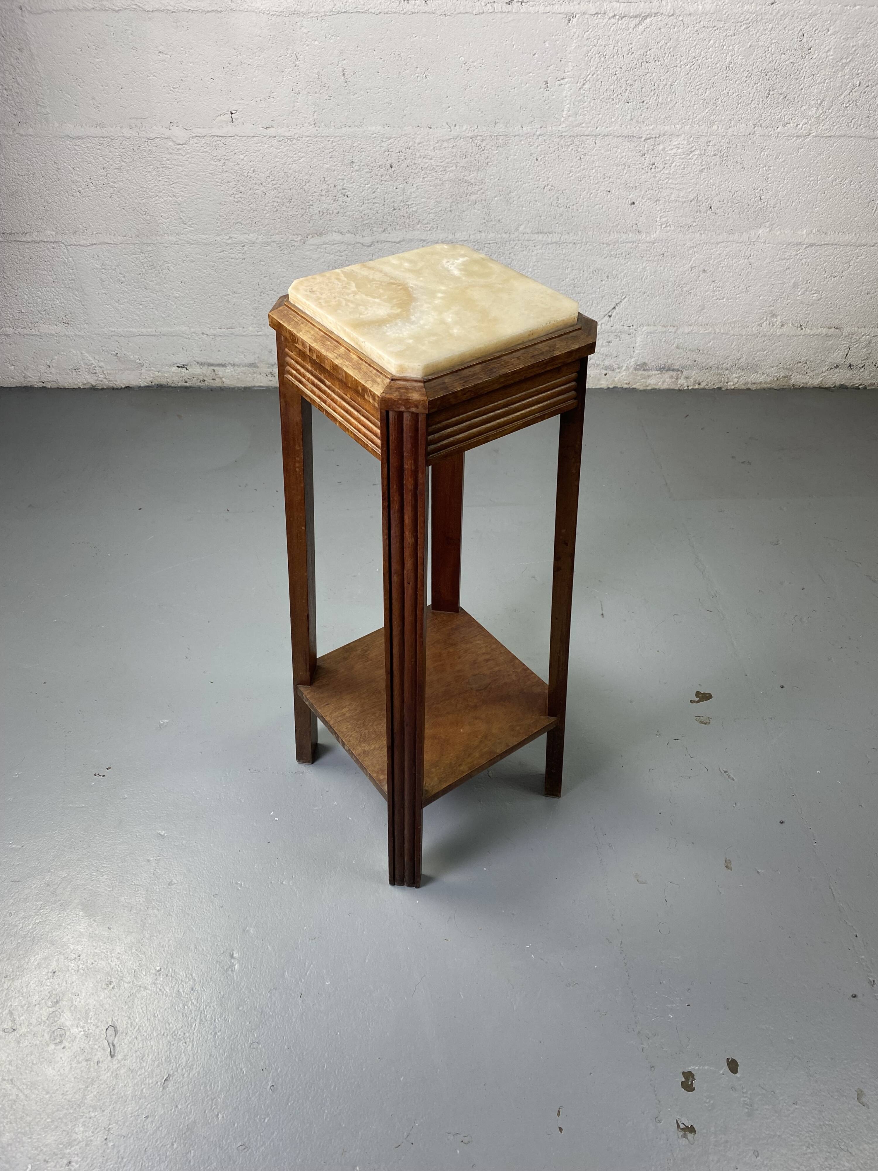 Wooden stool with marble top